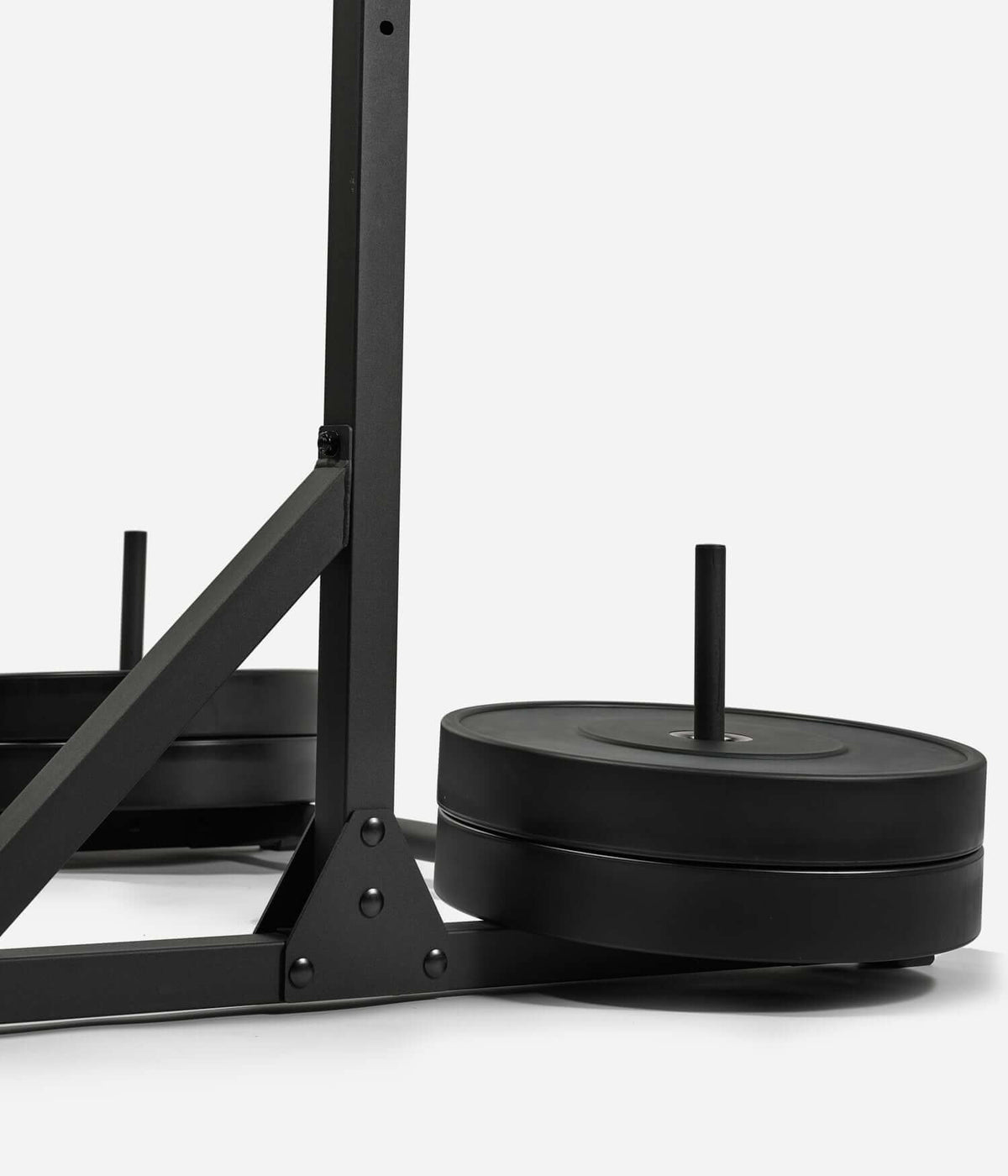 Colonnes de Stabilisation - Barre de Traction avec poids, offrant stabilité pour les entraînements musculaires.